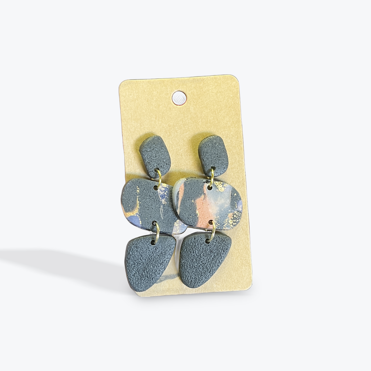 Neutral clay statement earrings crafted by Earbobs