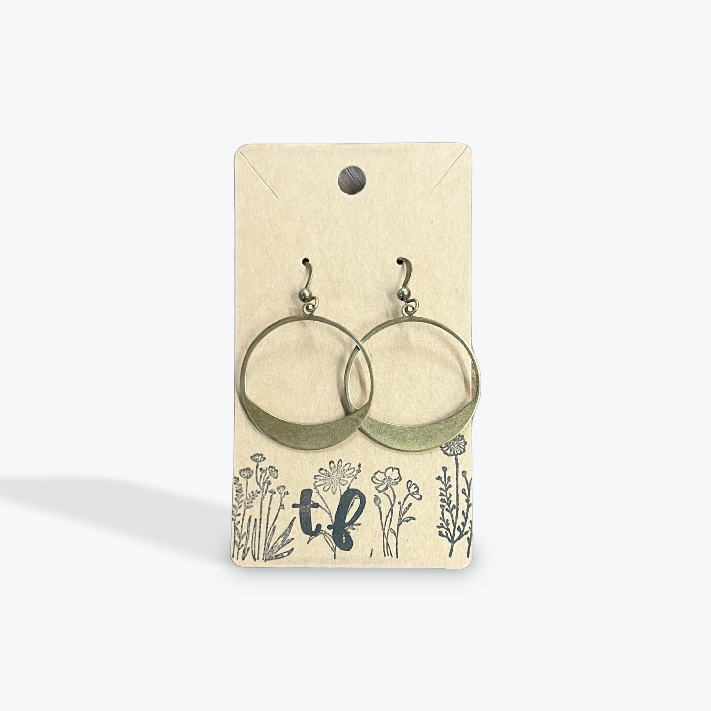 Handmade earrings crafted with artisan gemstone and metal detail