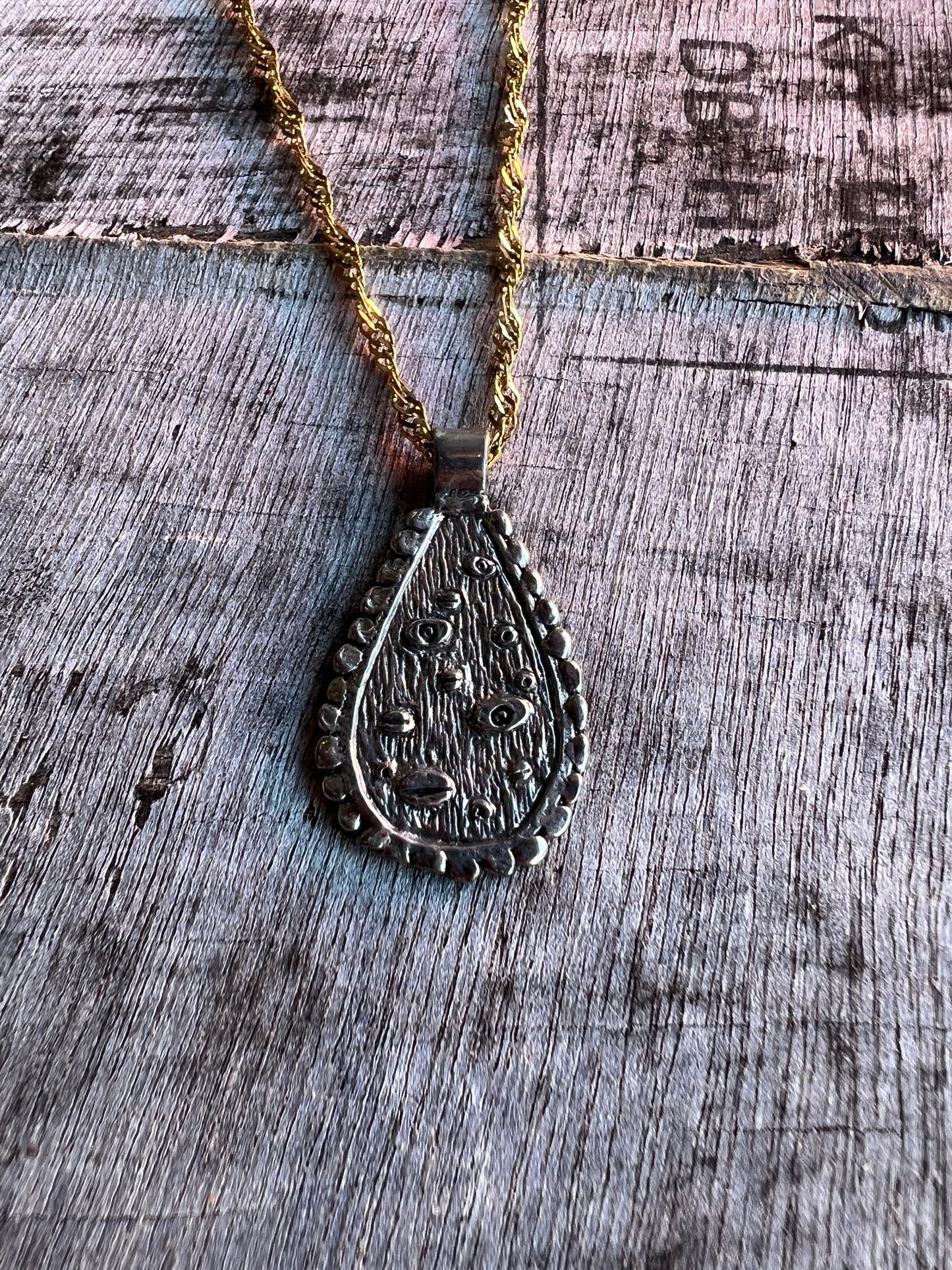 Mixed layering necklaces with statement pendants
