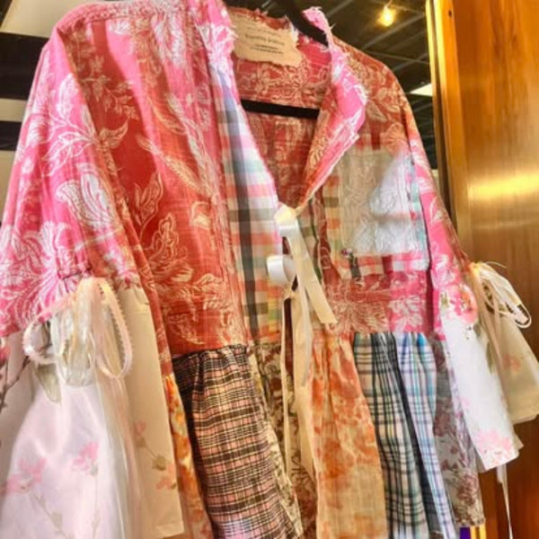 Artisan-inspired boutique dress with handmade patchwork design and vibrant patterns – women’s apparel from Emporium 23.”