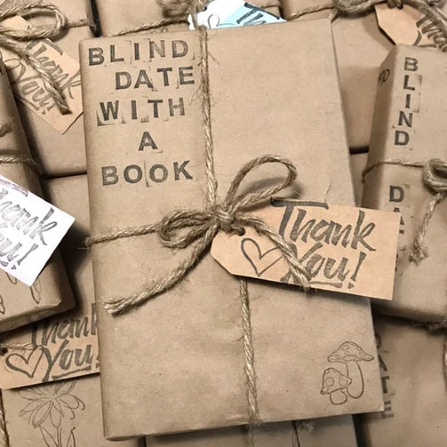 wrapped mystery book gift with neutral aesthetic
