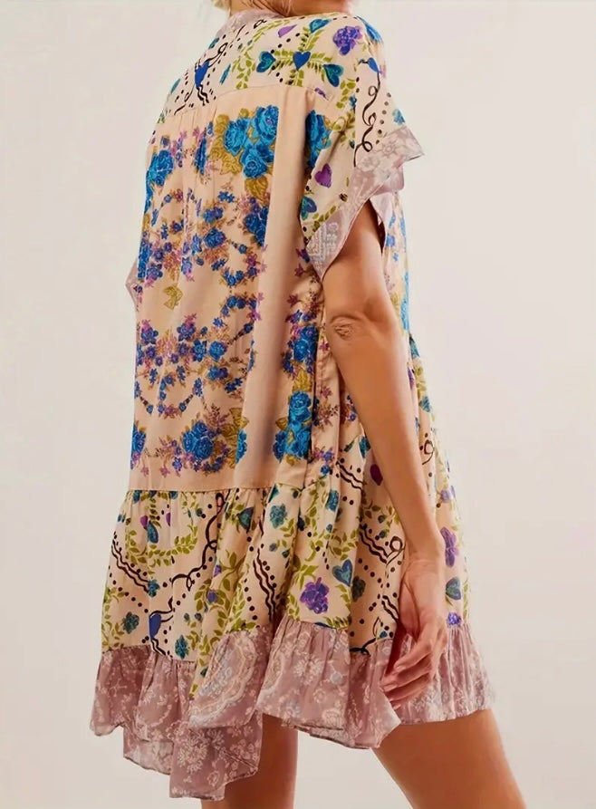Printed babydoll dress with empire waistline and pockets