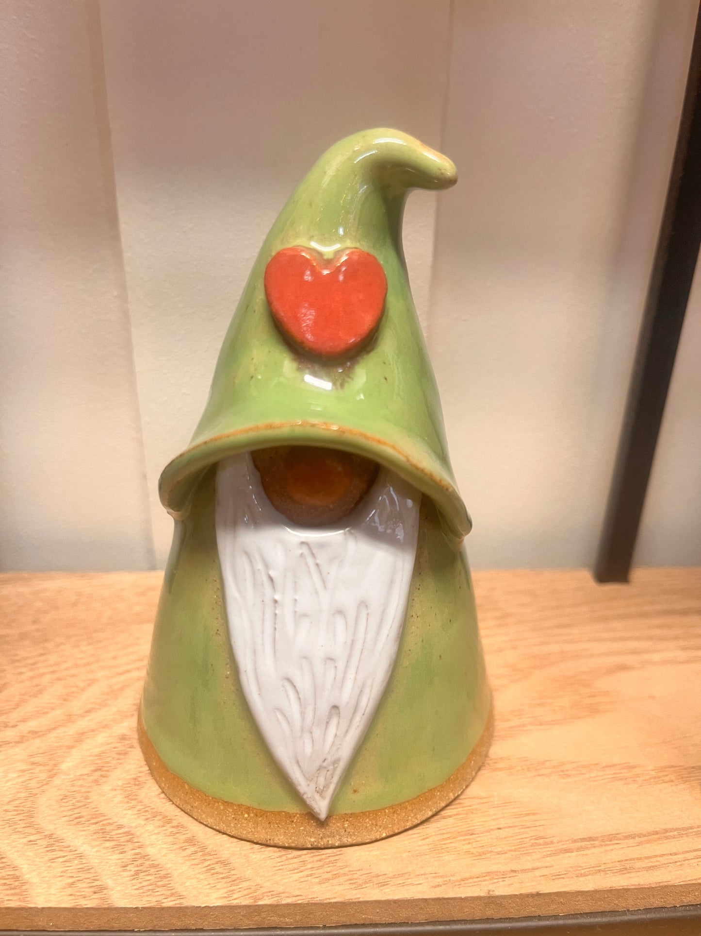 Handmade pottery gnome figurine with colorful glaze