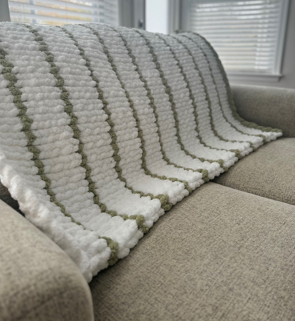 Handmade chunky knit throw blanket adding warmth and texture