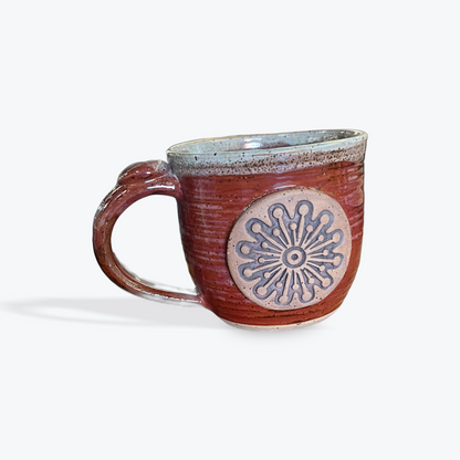 Handmade ceramic mug by Grace Williams with artisan glaze