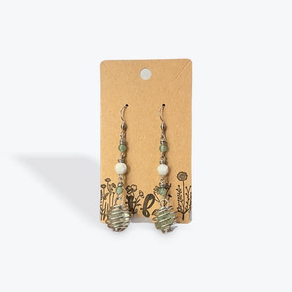 Boutique handmade earrings designed with gemstone and metal accents