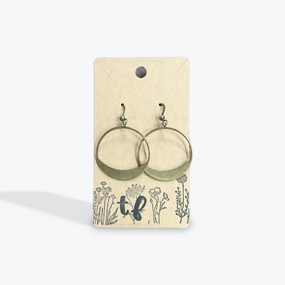 Handmade earrings crafted with artisan gemstone and metal detail