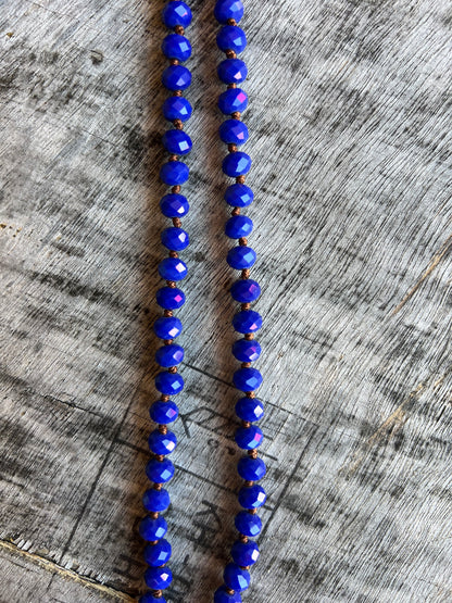 Blue plastic bead rope necklace for layering