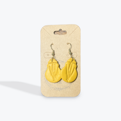 Festive seasonal earrings that pair with cozy layers