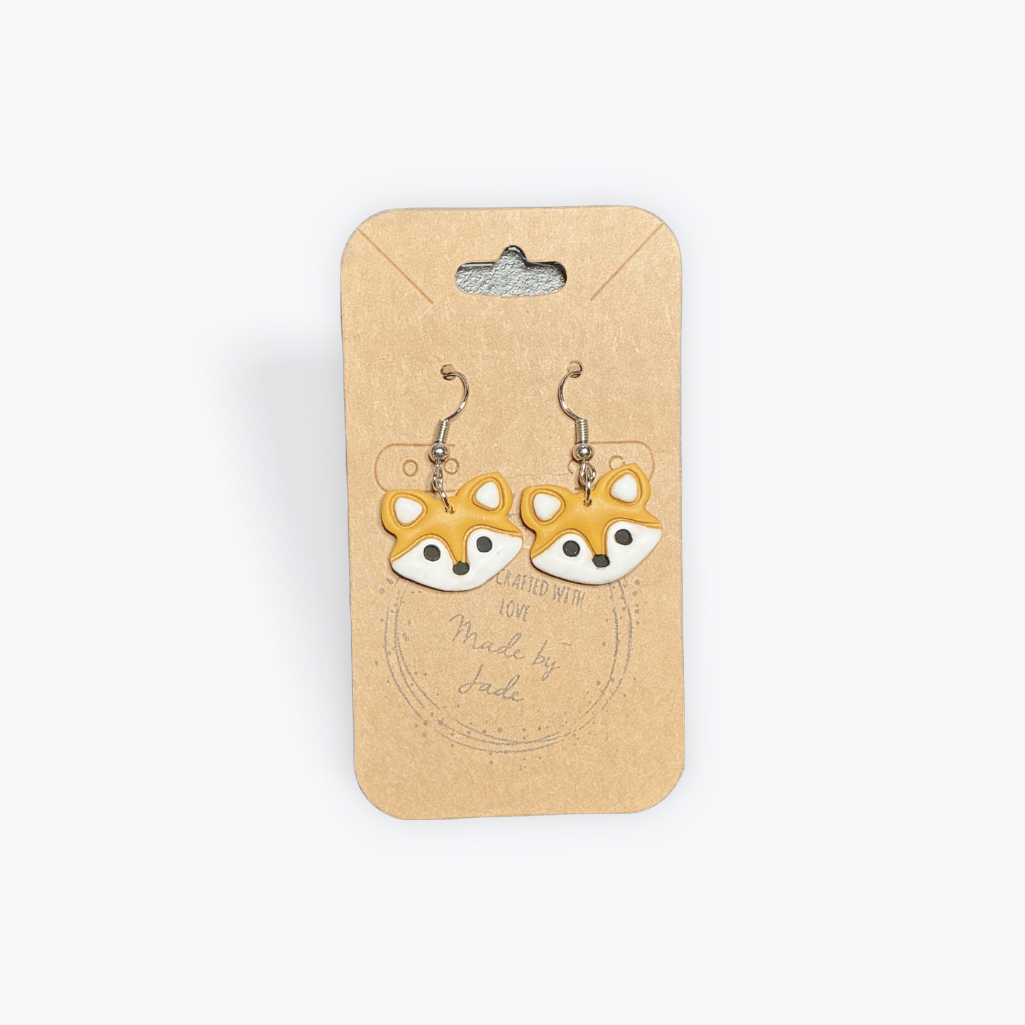 Handcrafted clay earrings with unique geometric style
