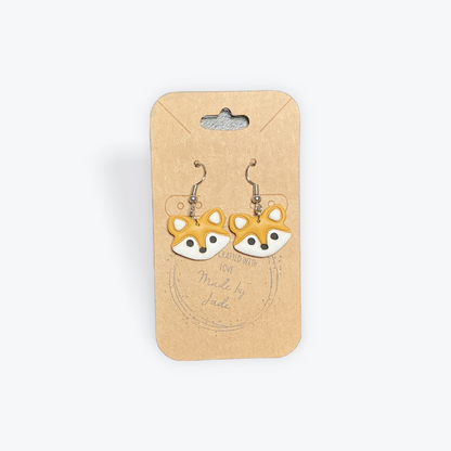 Handcrafted clay earrings with unique geometric style