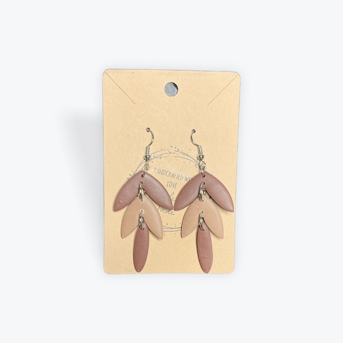Creative handmade earrings with artisan clay finish