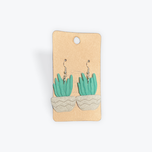 Lightweight clay earrings in neutral artisan style