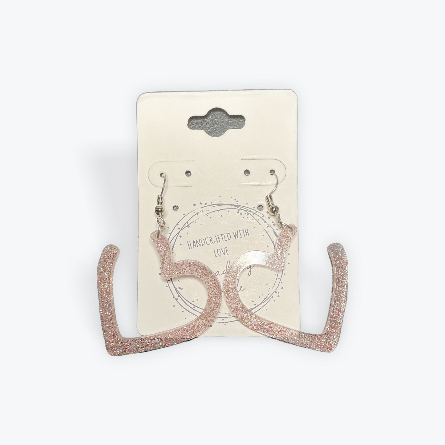 Statement earrings featuring handmade clay elements