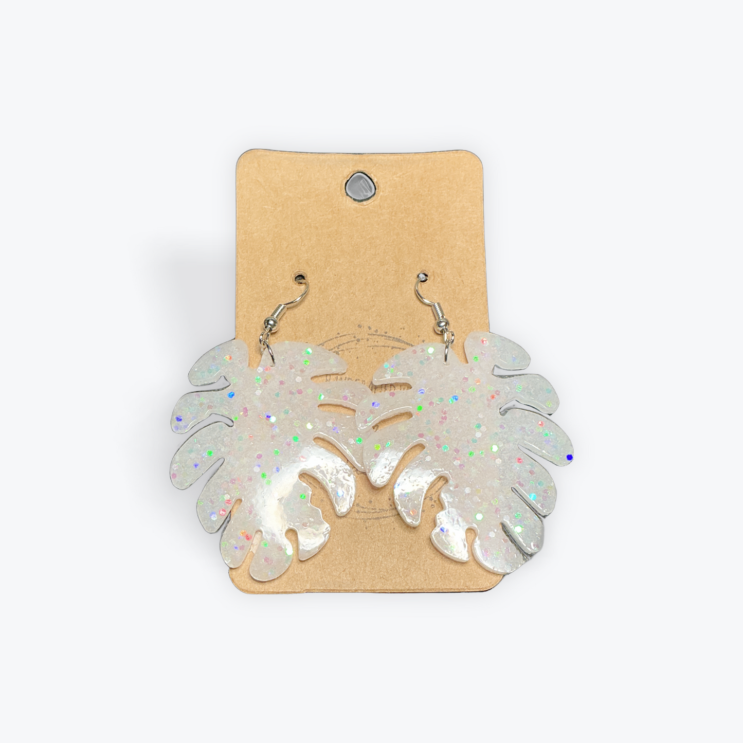 Handmade artisan earrings with bold clay patterns