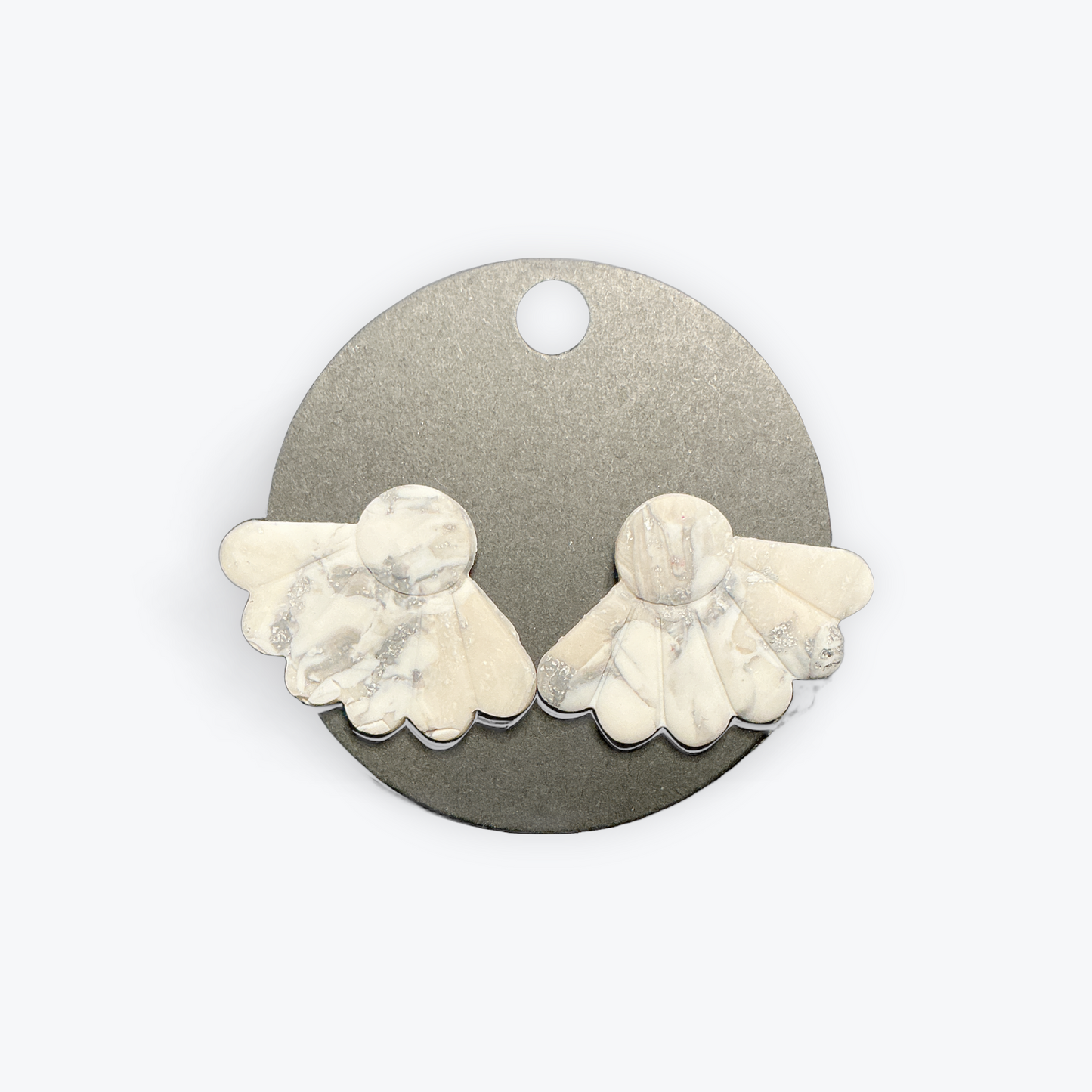 Artisan earrings with creative clay craftsmanship