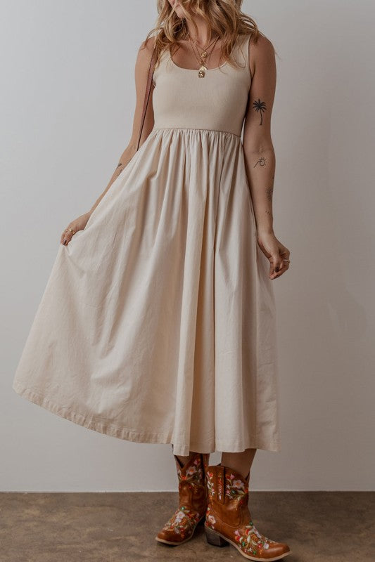 Nude ribbed midi dress with pocket detail knit