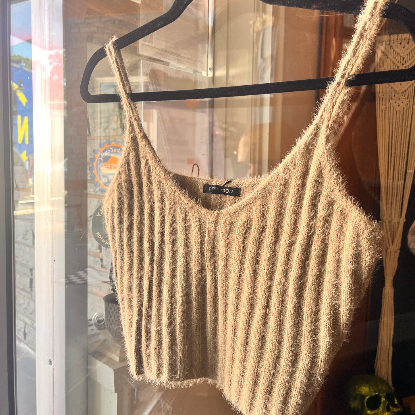 Sleeveless PaperMoon knit tank designed for layering and everyday wear