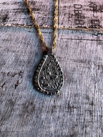 Mixed layering necklaces with statement pendants