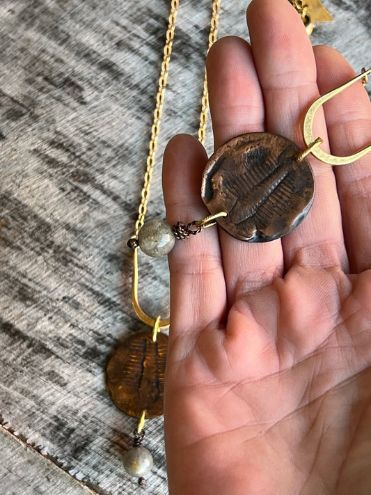 Unique artisan necklace with mixed metal chains