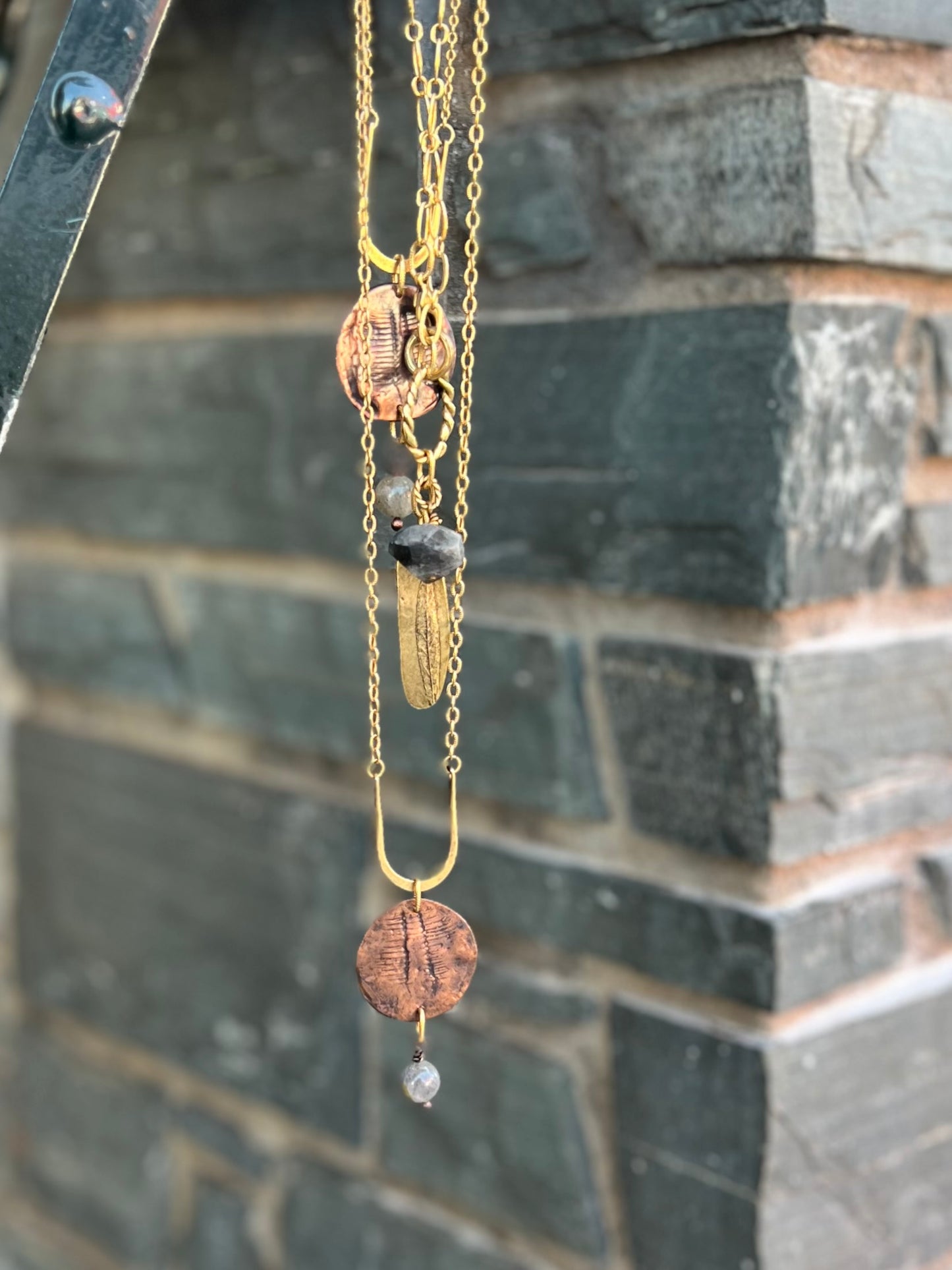 Artisan layering necklace crafted with mixed metals