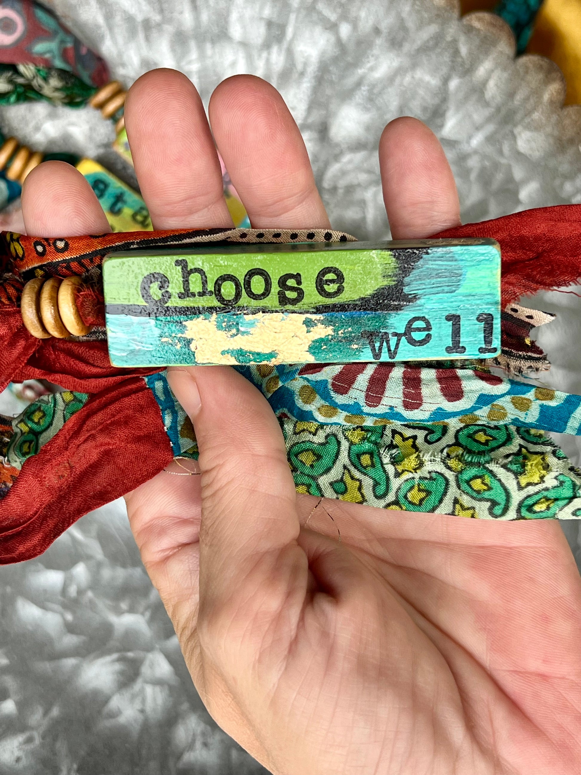 Unique handmade ornament featuring painted artistic detail