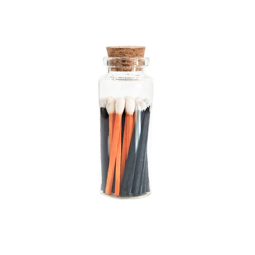 Vintage-inspired matches in glass bottle for home décor