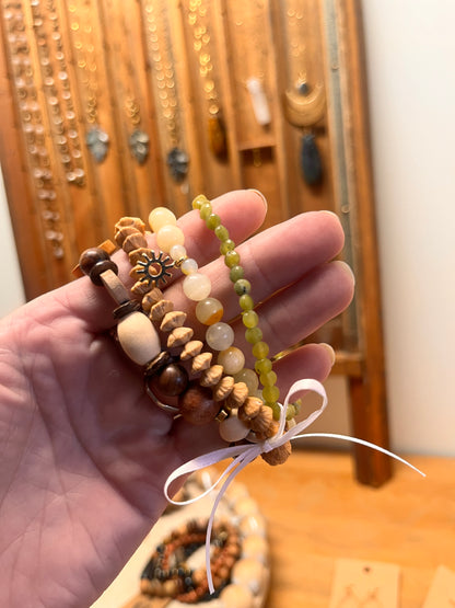 Coordinated bracelet pack featuring colorful handmade beads