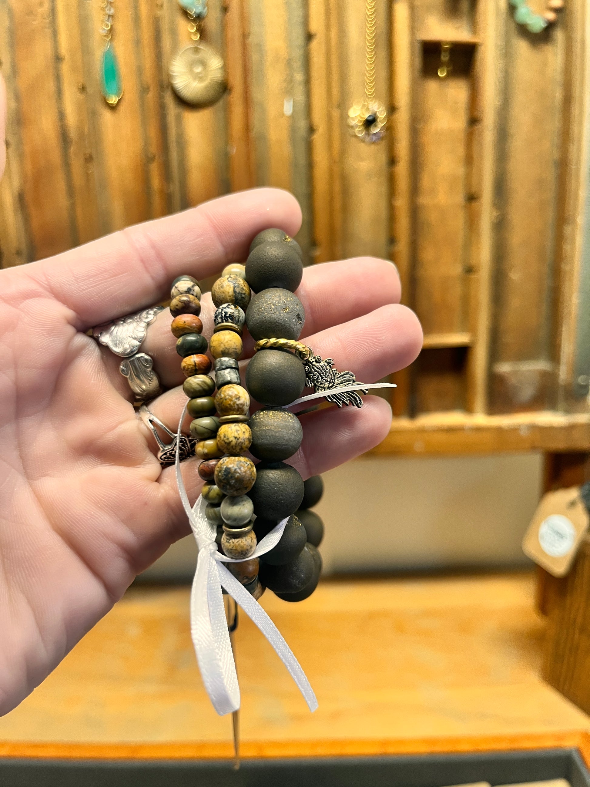 Handmade stacking bracelets with coordinated colors and textures
