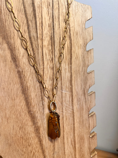 Handmade artisan necklace featuring colorful beadwork and detail