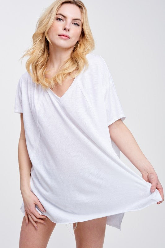 Zutter oversized V-neck tunic tee styled with jeans
