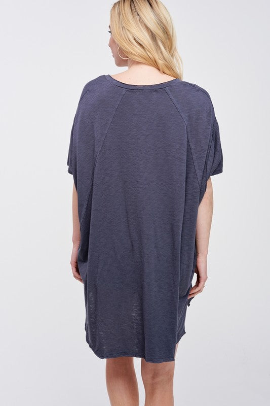 Zutter oversized V-neck tunic tee layered with jacket